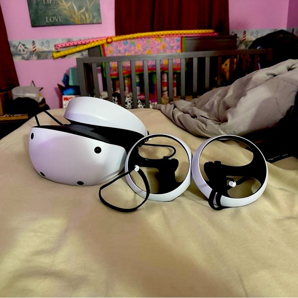 PlayStation VR2 with Paddles and Pulse 3D headset if interested! - Picture 1 of 4